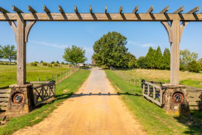 Two JJ Ranch entrance, Quitman Arkansas. Wilson Auctioneers sold this 1,190 farm property in 2025.
